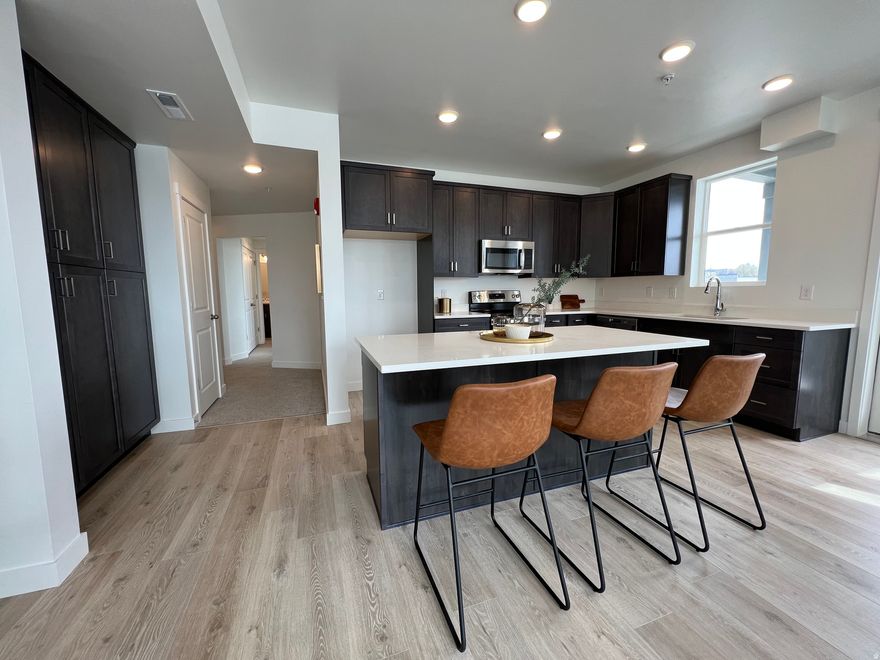 **Utah's local award winning builder, Holmes Homes, is back with some amazing new condos! Located in the center of the valley in Midvale, this community is easily accessible to anywhere in the valley. Call today to schedule an appointment and secure your unit in these early phases!**  **preferred lender incentives offered**