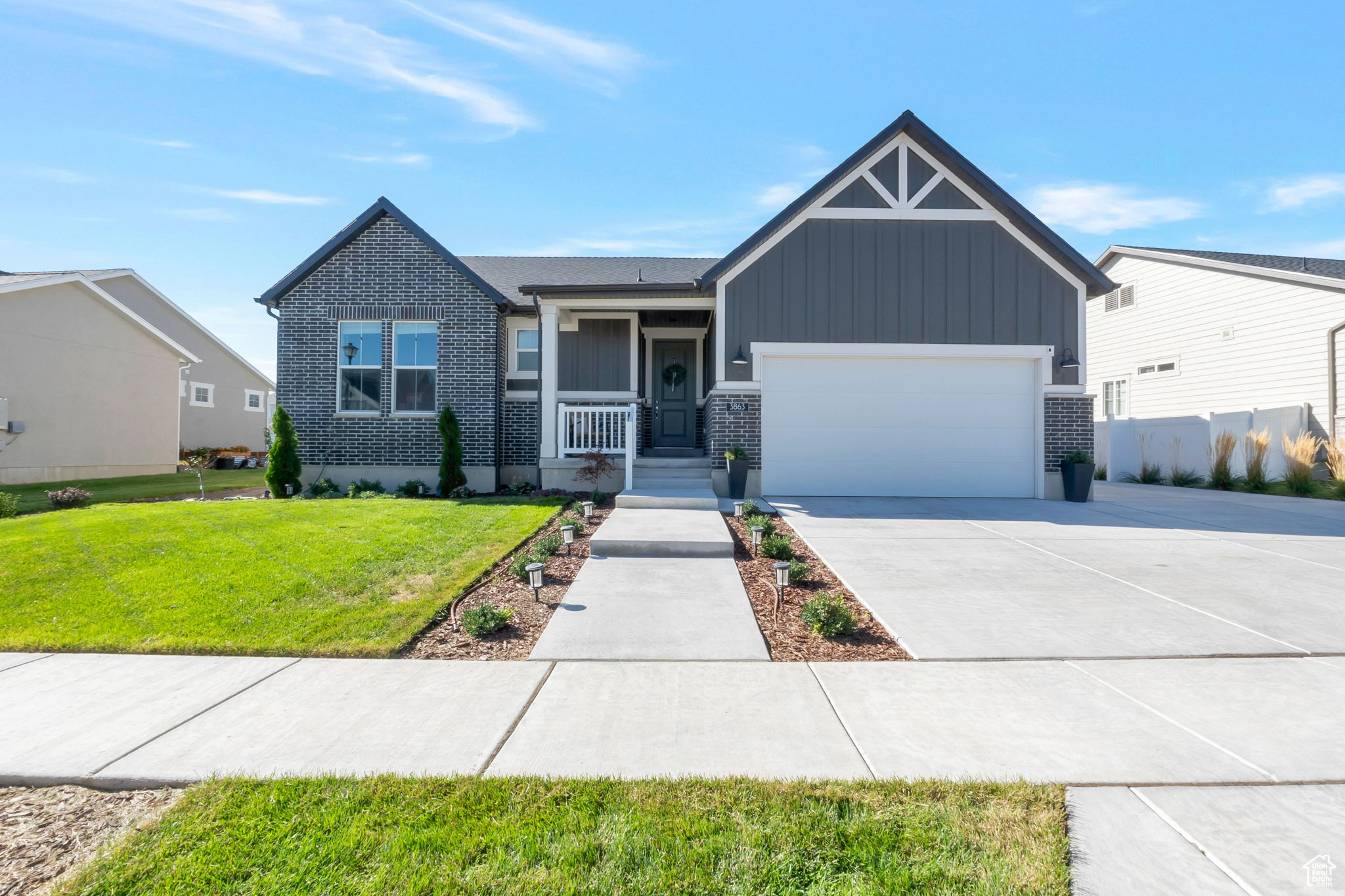 Beautiful and practically new 3-bedroom, 2-bathroom modern farmhouse in the coveted Holbrook Farms neighborhood! This home features an open, light-filled layout with stylish finishes throughout. Enjoy a welcoming community with parks, playgrounds, and walking trails-all just minutes from Primary Children's Hospital, top-rated schools, and great shopping. Conveniently located near Redwood Road, 2100 N, and I-15 for quick commuting. The unfinished basement offers room to grow and customize to your liking, while the fully extended RV pad provides extra parking and space for backyard gatherings. Don't miss this perfect blend of comfort, style, and location! Square footage figures are provided as a courtesy estimate only and were obtained from county records and home builder. Buyer is advised to obtain an independent measurement.