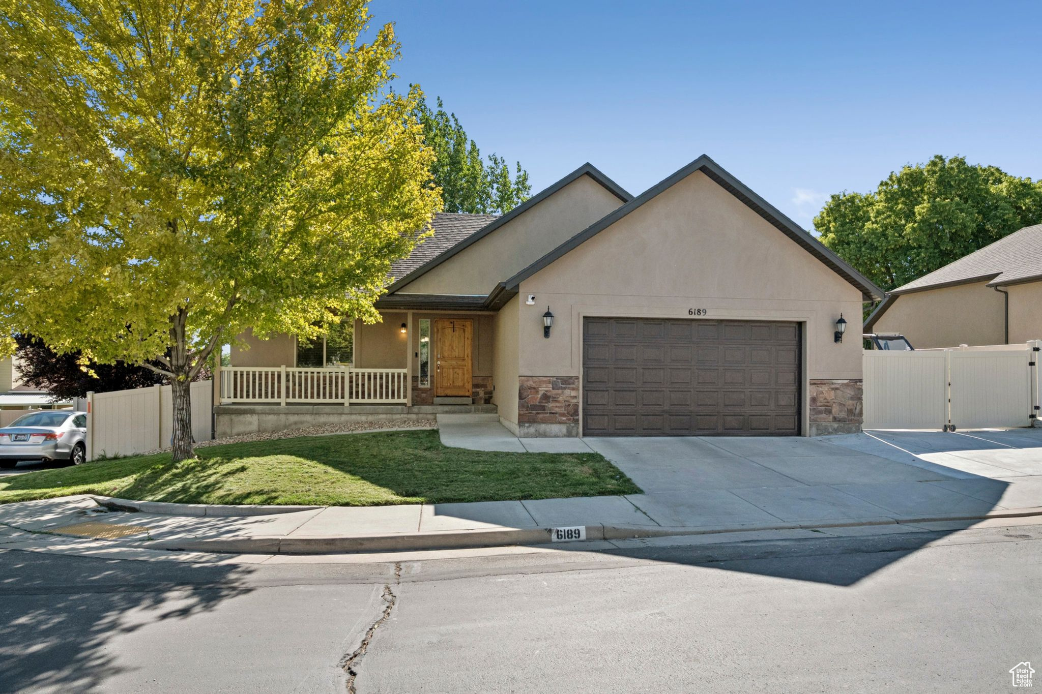 * New Price* Tucked away on a private lane with only six homes, this rambler is the perfect retreat right in the middle of it all. With quick access to I-15, I-215, and Redwood Road, you'll love how convenient it is to get anywhere-yet once you're home, the neighborhood feels peaceful and quiet, like your own little hideaway. Step inside to an open floor plan designed for everyday living and easy entertaining. The spacious kitchen features granite countertops, stainless steel appliances, a brand-new oven, and a nearly new dishwasher. It flows effortlessly into the living and dining areas and out to a fully fenced backyard with fresh landscaping and new rock in the flowerbeds. Here, you can relax, host BBQs, or simply take in the beautiful views of the Wasatch Range. This home also comes with thoughtful updates and big savings: solar panels that will be completely paid off at closing, a portable Yeti 3000X generator tied into the home, a new water heater, and plenty of storage throughout the basement and garage. A rare blend of convenience, quiet, and comfort-this Taylorsville gem is truly move-in ready and waiting for its next family. *Preferred lender incentive: Carlos Diaz at Intercap lending is offering a 1% credit towards closing costs or a one-year buydown where your rate is 1% lower for the first year!* Square footage figures are provided as a courtesy estimate only and were obtained from previous listing. Buyer is advised to obtain an independent measurement.