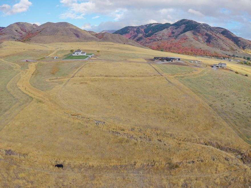 This 4.7-acre lot in New Canyon presents a strong value with a private well already in place, plus power and fiber optics to the property-saving significant time and upfront cost. Take in sweeping 360 views of the surrounding mountains and fields, with frequent wildlife adding to the setting. Forest Service land and trail systems are just  mile away, offering immediate access to outdoor recreation. Light CCRs and an architectural committee help maintain quality while avoiding the burden of a traditional HOA. Whether you're planning a full-time residence or a recreational getaway, this property delivers a balanced combination of accessibility, privacy, and natural appeal.