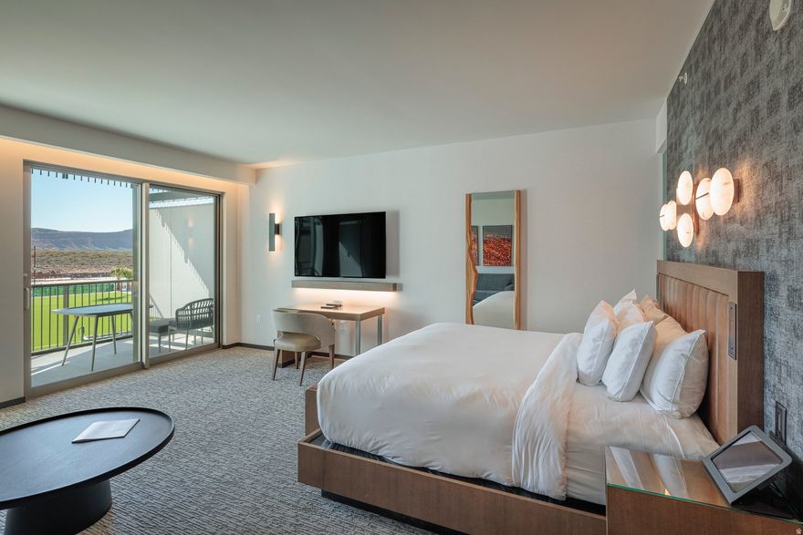 Positioned on the second floor, this King residence offers sweeping views of the stunning Red Rock landscape, creating a dramatic backdrop for your private retreat. Designed within the Resort Center Studios, the space combines modern elegance with effortless comfort.  Inside, you'll find premium Wolf and Sub-Zero appliances, high-end finishes, and a thoughtfully designed layout that maximizes both style and functionality. Step onto your spacious balcony to take in the striking scenery and enjoy seamless indoor-outdoor living.  Ownership includes access to world-class amenities such as championship PGA golf, exceptional dining venues, a full-service spa, state-of-the-art fitness center, and expansive meeting and convention facilities -- with even more to come.   Offered fully furnished and completely turn-key, this residence is currently participating in the rental program, creating a unique opportunity for both personal enjoyment and income potential.