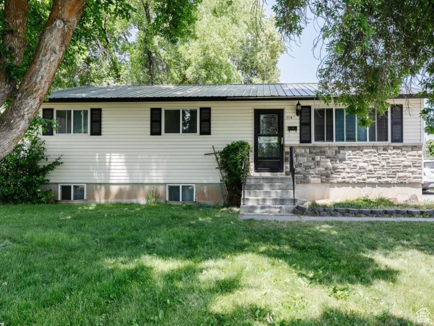 PRICE REDUCTION on this well-maintained 2-level home in town featuring 5 bedrooms and 1  remodeled bathrooms, including a sleek walk-in shower upstairs. Enjoy peace of mind with a newer metal roof and brand new water heater. This home blends comfort and updates with room to grow-ideal for anyone needing extra space with an outbuilding for even more storage. Convenient location close to schools, parks, and shopping!    Square footage figures are provided as a courtesy estimate only and were obtained from assessor's office.  Buyer is advised to obtain an independent measurement.   Call for your showing soon before it is too late!
