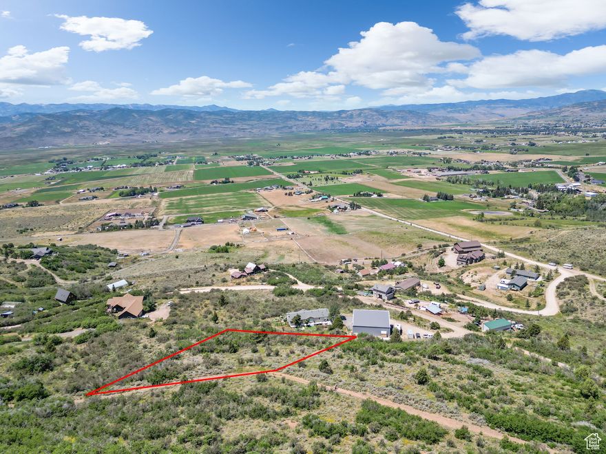 Tucked in the quiet hills of Kamas East, this 0.68-acre lot is the perfect place to build your dream home or private mountain cabin getaway. With panoramic views of Hoyts Peak and the scenic Kamas Valley, you'll enjoy peace, privacy, and a daily connection to nature. The lot is  minutes from world-class skiing at Deer Valley, endless hiking and ATV trails in the nearby national forest, and fishing, boating, and paddleboarding at Jordanelle and Rockport reservoirs. Whether you're looking for a year-round home base or a weekend retreat, this property offers the ideal blend of adventure, seclusion, and easy access to both Kamas and Park City. Please note: the owner will need to apply for a water right and a start card in order to drill a well.