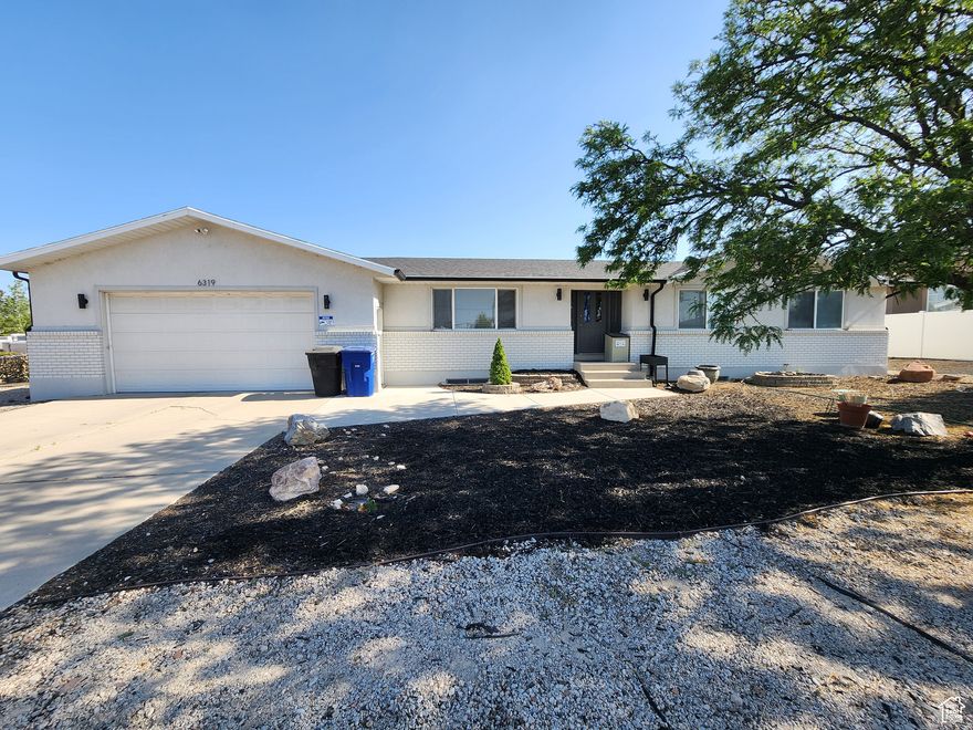 Renovated home with large lot. There are so many wonderful upgrades in this home. Zoned office commercial but residential use is grandfathered in. Great road frontage. The home is currently being used as a business. You want to open a business? Go ahead, no renovation needed, the home is already perfect. Extended heated 2 car garage Fruit trees, landscaping, fencing etc. If you don't want the house but do the land, seller is open to subdividing a half acre lot, reach out to talk details!