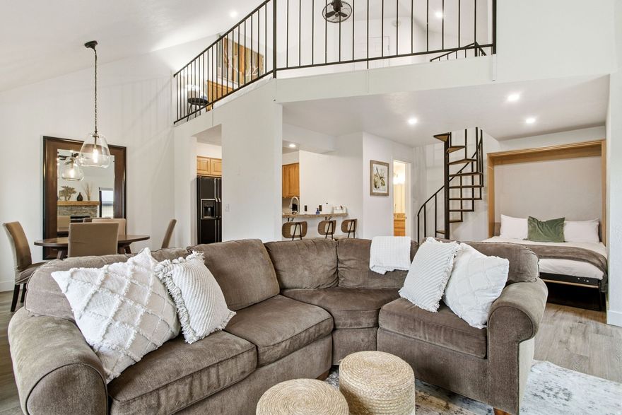 This beautifully appointed loft style 1 bedroom, 1 bathroom top-floor condo, blends updated interior and comfort with unbeatable proximity. The spacious loft easily accommodates a queen bed with an extra twin bed nook.  Recently refreshed from the inside in 2023 to the outside in 2024, the condo features a brand-new cold roof, energy-efficient double-pane Pella windows, and contemporary exterior siding, giving it a like-new feel. Inside, enjoy fresh interior paint, an updated bathroom, and a warm inviting living area anchored by a cozy fireplace-perfect for aprs-ski gatherings. Imagine owning a mountain retreat where the future of Canyons Village convenience is quite literally at your doorstep. Beginning in the 2026/2027 winter season, the brand-new **Cabriolet lift stop-just steps from your front door-**will provide direct access into Park City Mountain Resort, the largest ski resort in the United States. Until then, enjoy true ski-out access today, with a complimentary resort shuttle connecting you effortlessly to the lifts, dining, shopping, and aprs-ski scene throughout Canyons Village.  Year-round resort living is complete with community amenities including a swimming pool, hot tub, sauna, tennis and pickleball courts, and clubhouse. Two dedicated parking spaces-a rare and valuable convenience-make coming and going effortless. Whether you're seeking a family ski retreat, a high-demand rental investment, or the perfect combination of both, this turn-key condo offers an exceptional blend of location, lifestyle, and future appreciation in one of Park City's most exciting growth corridors.