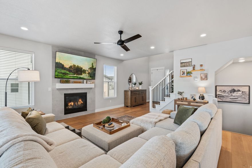 Have you ever dreamed of purchasing a model home? This one will fulfill that dream.  This beautiful home has all the charm and stunning design elements of a model home PLUS all the added bonuses like a finished basement with wet bar, complete  landscaping & fencing, window coverings and more saving you thousands!!!  The expanded Cottonwood floorplan gives a boost of extra square footage. The gourmet kitchen is a dream. Not only does the primary bedroom have a luxurious bathroom, but the guest suite also boasts an en suite bathroom and walk in closet as well. The two additional bedrooms have a jack and jill bathroom completing the perfect set up for everyone to have plenty of space, comfort and privacy.  The den, exercise room and entertainment/family room are all added bonuses you will love! All listing information is deemed accurate. Buyer to verify.