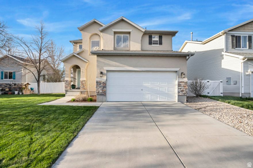 Welcome to your dream home in the highly sought-after planned community of Stansbury Park, Utah! This beautiful, well-maintained residence offers the perfect blend of comfort, style, and convenience in one of Tooele County's most desirable neighborhoods. Nestled in a family-friendly, thriving community surrounded by stunning natural beauty-including the iconic lake, parks, golf course, and Oquirrh Mountains-this fully finished home boasts 4 spacious bedrooms and 3 full bathrooms, providing ample space for everyone. Step inside to discover meticulous attention to detail throughout, with modern finishes, an open and inviting floor plan, and thoughtful updates that make everyday living a joy. The home features a new roof (still under full warranty for peace of mind) and a 2-car attached garage for easy access and extra storage. Outside, enjoy your own private oasis in the fully fenced, mature landscaped yard-perfect for relaxing, entertaining, gardening, or watching the kids play safely. The established trees and greenery add charm and privacy you'll love. Location is everything here: just minutes from top-rated local schools (including elementary, junior high, and Stansbury High School), a variety of restaurants and dining options, parks, recreation, and easy access to I-80 for a quick commute to Salt Lake City. Priced to sell in this competitive market, this turn-key gem truly feels like "Welcome Home!" Don't miss your chance to own a piece of Stansbury Park paradise-schedule your showing today!  Sq footage provided was obtained from county records buyer/buyers agent to verify all
