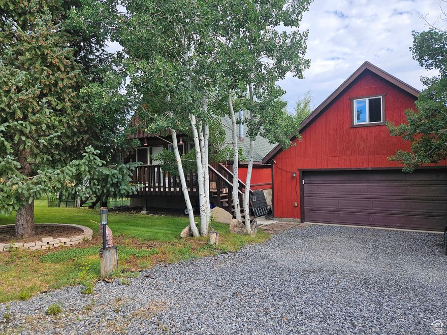 * Stunning Cabin looking over Soldier Creek Strawberry Reservoir!! * Beautiful Views of the lake right from your back yard!! * You'll fall in love with this updated 2 bed 2 bath cabin with Year-Round Access (with snowcat) in Soldier Creek Estates * Home has all you need for year-round living with private water, power & septic in a gated private community * Very cozy living room with a fancy wood burning stove, beautiful wood finishes & vaulted ceilings * Updated kitchen featuring knotty-alder cabinets, butcher block counters, newer stainless steel appliances & gas or electric stove! * Newer hardwood & laminate flooring * Newer remodeled bathroom with comfortable clawfoot tub * All electric heat & newer central AC * Upstairs has a loft bedroom with nice space * Downstairs has a master bedroom, bathroom & walk-in closet with laundry room & storage room with freezer included * Downstairs french doors leading to nice patio & hangout area with many tall, mature trees and peace & quiet, fresh mountain air & a firepit * Large detached garage with loft above for possible living space & space-heaters/electric installed - garage also has 2 doors to open from either side * Located near the end of a could-e-sac with AMAZING views of the lake & a water hydrant for safety * Come enjoy living the dream full-time, out of the city where the wildlife roam freely & you can enjoy all your outdoor adventures such as boating, hiking, hunting, fishing, kayaking, 4wheeling & more, right out your back door! * Perfect for a vacation home too! * Located just minutes from Hwy 40, easy access & great location! * BONUS Snowcat & Fishing Boat included if buyers want it. Cabin can come fully furnished if buyer is interested * Buyer to confirm square footage provided by county records.