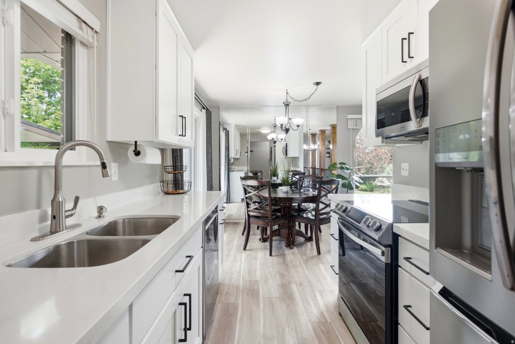 Photo of 4340 S HAWARDEN DR, West Valley City, UT 84119 (MLS # 2166409)