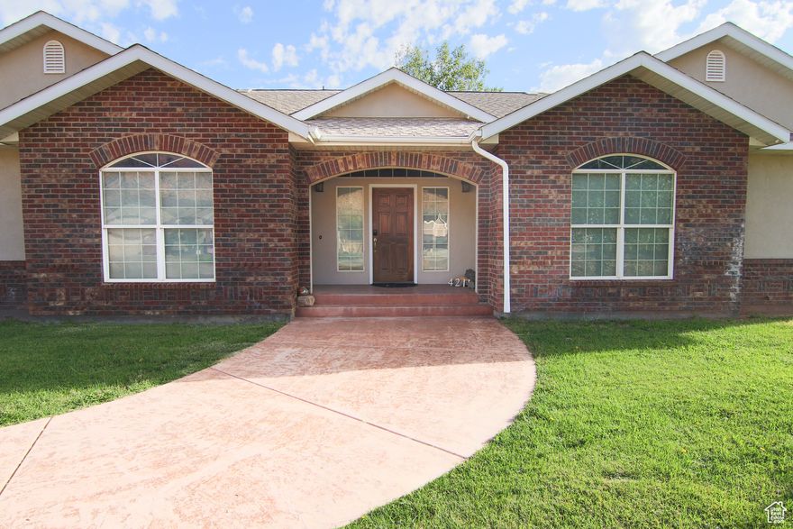 Welcome to 4211 Valle Del Sol, a 2,172 sq. ft. home with 4 bedrooms and 3 bathrooms in a highly sought-after Moab location. Recent improvements include a remodeled master bathroom, new roof on the shop, insulated and drywalled garage, updated hot water heaters, a sprinkler system, and an RV 50-amp hook-up. Inside, enjoy a bright and functional layout with spacious living areas, a practical kitchen, and versatile bedrooms, while the outdoor space offers sweeping red rock views and plenty of room to relax or entertain. Conveniently close to schools, shopping, dining, and world-class recreation. *Please note: property tax rates may differ for a primary residence.