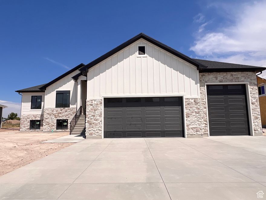 SELLER IS OFFERING $10,000 IN LENDER CONCESSIONS TO BE USED TOWARDS CLOSING COSTS AND OR PREPAIDS!! INCREDIBLE 3 BEDROOM 2.5 BATHROOM RAMBLER ON A 1/3 ACRE LOT WITH AN AMAZING VIEW OF THE MOUNTAINS. CUSTOM KITCHEN WITH 2 TONE CABINETS, QUARTZ TOPS, TILE BACKSPLASH AND GAS RANGE. MUDROOM BENCH OFF OF GARAGE ENTRANCE ALONG WITH A 1/2 BATH AND OVERSIZED LAUNDRY. GREAT ROOM HAS A GAS FIREPLACE WITH FLOATING SHELVES. ACCESS TO THE COVERED DECK FROM THE DINING ROOM OR MASTER BEDROOM. MASTER SUITE INCLUDES RECESSED LIGHTING, SEPERATE TUB/SHOWER, DOUBLE SINKS, WALK-IN CLOSET AND PRIVATE TOILET ROOM. FULL UNFINISHED BASEMENT WITH ACCESS FROM THE MASSIVE 4 CAR GARAGE. BASEMENT ALSO HAS A NICE SIZED COLD STORAGE ROOM. AMAZING FLOOR PLAN WITH ALL OF THE EXTRAS!! HOME TO BE COMPLETE IN THE NEXT 30 DAYS