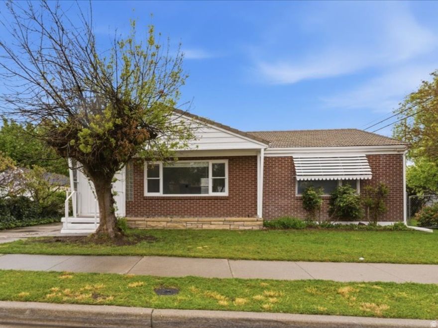 Come take a peek at this charming Rambler home in the heart of Salt Lake City! This 1,886 sqft home offers 4 bedrooms, 2 bathrooms, and a 2-car garage on a fully landscaped lot. Recent upgrades include brand new carpet, refinished hardwood floors, fresh interior paint throughout, updated kitchen with new countertops with stylish backsplash. New vanities and toilets in both bathrooms. The home also features a newer central air unit & furnace, for peace of mind. Enjoy outdoor living with a covered patio perfect for entertaining in your fully landscaped backyard. Square footage figures are provided as a courtesy estimate only and were obtained from tax data .  Buyer is advised to obtain an independent measurement.