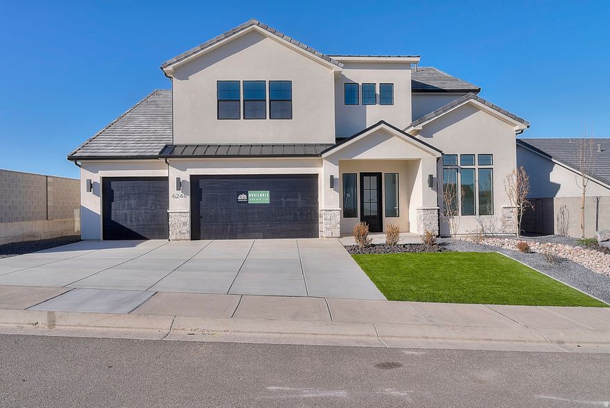 MAJOR PRICE IMPROVEMENT! Welcome to the Summitglow, an impressive 3,634 sq ft home designed to elevate everyday living. Featuring 6 bedrooms, 3.5 bathrooms, and 3-car garage, this home offers room to grow with refined style throughout. Enjoy soaring 10' ceilings on the main level and 9' ceilings upstairs, complemented by 8' tall doors that enhance the home's grand, open feel. A front office provides the perfect workspace, while the oversized upstairs loft offers endless flexibility for a media room, play space, or second living area. The heart of the home shines with elevated finishes, including generous kitchen cabinetry, a tiled backsplash, 3cm quartz countertops, a built-in hood, and upgraded appliances-fridge included.  The spa-like primary suite is a true retreat, highlighted by a stunning freestanding tub and upscale finishes. Additional upgrades include a modern black railing, built-in mudroom bench, laundry room cabinetry, upgraded carpet and pad, and a large covered back patio ideal for outdoor entertaining. Thoughtfully designed and beautifully finished, the Summitglow delivers luxury, comfort, and functionality in one exceptional home.  All information is deemed reliable but not guaranteed, buyer to verify all.