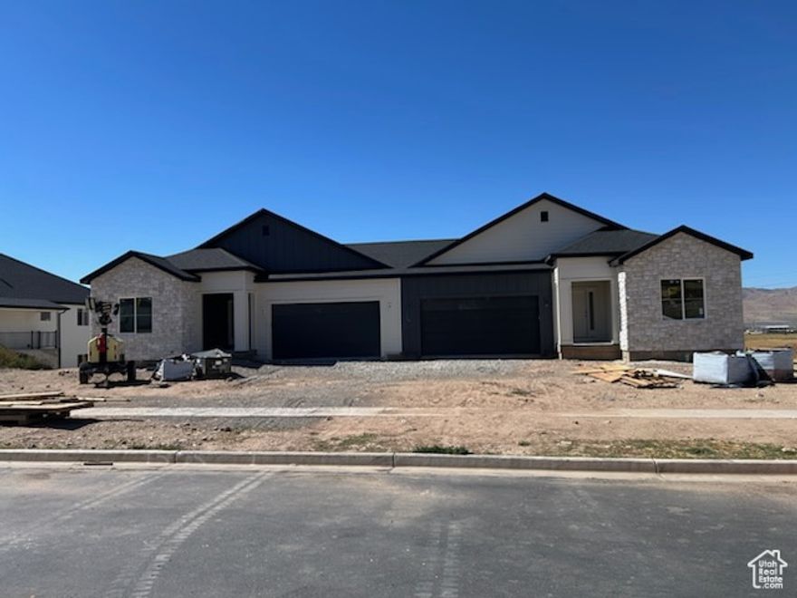 Urban homes twin home plan.  This is a great layout with 3 bedrooms, 2 bathrooms, upgraded finishes such as tile bath surrounds, upgraded flooring, lighting, concrete exterior stairs, full hardi with rock. and much more.  these will be done around the end of November.  Call today to lock in this great plan and price!!!!  Ask about lender incentives for using preferred lender.   taxes are estimated buyer and buyer's agent to verify all info. all colors and options have been selected.