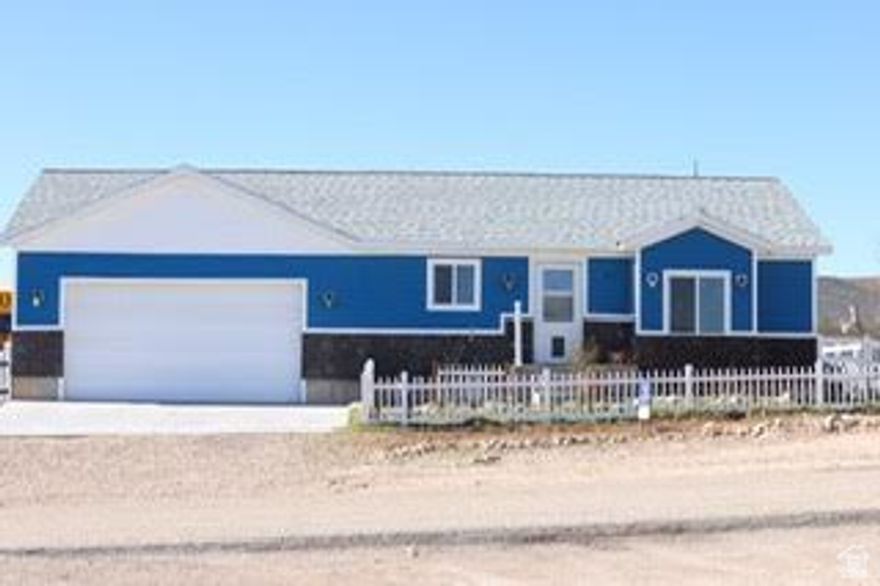 Welcome home to this stunning 2020-built ranch rambler nestled in the sought-after River Heights subdivision. With 4 spacious bedrooms, 2 bathrooms, and a fully finished interior, this home offers modern comfort, thoughtful design, and room for everyone. Step inside to an open-concept floor plan featuring granite countertops, abundant natural light, and a main-level primary bedroom for easy, single-level living. You'll love the large laundry room, oversized finished garage, and plentiful storage throughout the home-everything has been designed with convenience in mind. Situated on a .29-acre landscaped lot, this property includes large RV parking and a fully fenced backyard, perfect for outdoor living, pets, or future expansion. The yard is truly a standout feature, offering a rich blend of perennials, herbs, berries, fruit trees, and flowering plants that create a lush, vibrant, and low-maintenance landscape.