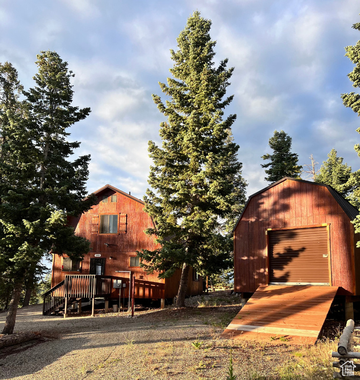 This cabin is set on a flat, usable apx. 1 acre lot at the top of a hill and the end of a cul-de-sac, making it a very private, peaceful retreat free from the majority of noise and dust that other homes are subject to. The lots were joined in 2021 and an aspen log fence surrounds the property. The orientation and location of the home ensure that this will always remain your peaceful oasis! The cabin itself is well-built and maintained and its lack of interior wood paneling mean that you won't be a slave to sealing the interior of your cabin. The decks and ramps have all been recently refinished and the entire home boasts completely new beds, bedding, couch, TV, stove and electric fireplace. The Four Hands dining table extends from about 5.5' to over 11', making it the perfect space to entertain your family and friends during summer parties or Thanksgiving meals. Enjoy access to Bryce and Zion within a short drive, or kayak at Navajo Lake, or enjoy the view from Strawberry Pointe. You can also just relax and marvel at the most amazing sunset views from your picnic area or enjoy making s'mores in the firepit. The master bedroom includes a queen sized bed, and a twin bed w/ twin trundle, along with a large closet area. The second bedroom includes a queen bed and a full bed w/ closet, and a desk for those working from home or kids doing online school. The second bedroom also lights up with glow-in-the-dark stars when the lights go out, bringing Southern Utah's amazing view of the starry sky right into your home! There's also a loft area with a full-size bed. The wood stove was replaced a few years ago and there are baseboard heaters. There is also an attic fan to help with cooling in the summer. The property includes 2 water meters and buyer can verify if another cabin can be built on the property, as there is ample space to do so. Strawberry Valley Estates is part of a homeowners association in which dues are optional. There is also access to a private airstrip and the assessment is about $80 a year. The county maintains the roads going up to your driveway in the winter and the property has ample parking for an RV or all of your toys. Winter access is limited. The road to the house is maintained but the driveway isn't.