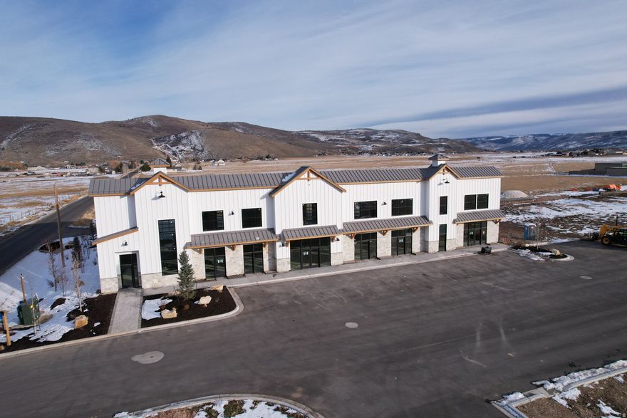 Discover an exceptional opportunity to secure a .79-acre pad-ready commercial building lot within the highly desirable Route 32 Project-one of the fastest-growing commercial corridors in the Kamas Valley. This site is fully improved and ready for immediate development, offering unmatched convenience, visibility, and long-term value for any owner-user, investor, or business looking to establish a presence in a thriving market. This premium lot comes fully prepared with all utilities already stubbed, including power, water, sewer, and fiber, significantly reducing both cost and timeline to build. With level topography, engineered soils, and direct access from Route 32, the site is perfectly suited for office, flex, retail, light commercial, or mixed-use applications. Positioned within a master-planned flex campus featuring high-quality construction, modern architecture, and professional neighboring businesses, this parcel benefits from excellent traffic counts, strong local demographics, and year-round activity from recreation, tourism, and full-time residents. Whether you're expanding your commercial footprint or looking for a strategic long-term asset, this lot offers the rare combination of readiness, location, and future upside-all within one of Utah's most supply-constrained markets.  .79 acres , pad-ready and fully buildable Engineered pad with level, compacted soils. Fast-growing area with strong demand and limited commercial inventory. Excellent visibility and accessible directly from Route 32 All utilities onsite and stubbed (power, water, sewer, fiber) Ideal for flex, office, retail, or light commercial Part of the upscale Route 32 flex campus