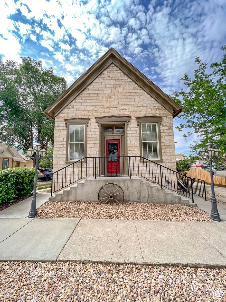 This historic Property was the original Ephraim City Hall and Jail. Built in 1872 and crafted with the same oolite limestone used in the construction of the Manti Temple, one feels like you are stepping back to the domain of the Wild West. A winding metal staircase connects three levels. From the warden's loft up top to the living hall, kitchen, and bunk bedroom on the main floor to the downstairs walkout basement. Which houses a prison cell bedroom, bathroom, and parlor. Authentic historical artifacts throughout the property, provide a museum like experience. Tributes to Utah's frontier days and memorabilia of wilder times abound. The restoration of the jail has preserved the charm of a bygone era.  The mixed-use zoning allows you to begin your Southwestern dream life as a homeowner or enables you to take advantage of a turn-key AirBnB business opportunity to share a piece of history with settler visitors from near or far.  Square footage figures are provided as a courtesy estimate only. Buyer is advised to obtain an independent measurement.