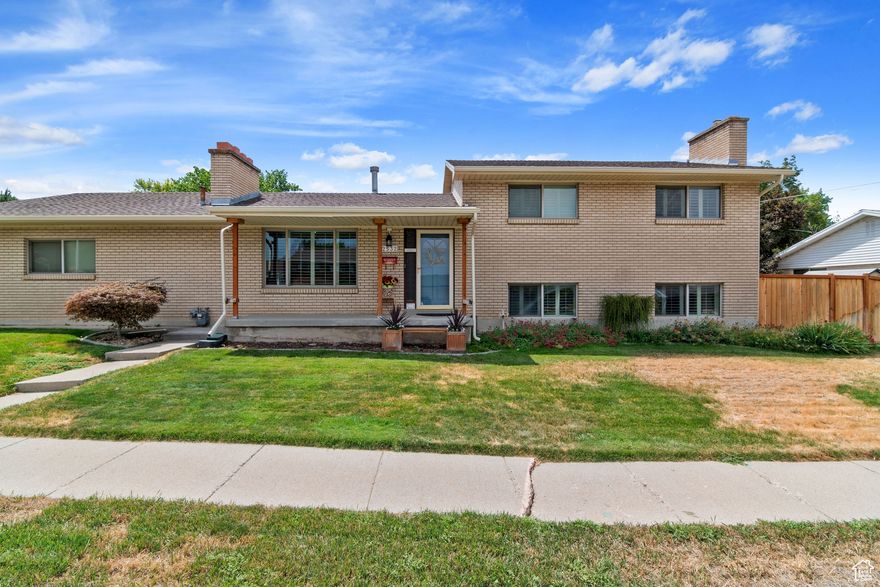 This impeccably maintained brick rambler in desirable Cottonwood Heights features a functional and inviting floor plan with four charming bedrooms, 1 tastefully updated bathrooms, and two cozy fireplaces. Enjoy both a bright main-level living room and a spacious daylight family room with walkout access to the backyard. The oversized two-car garage offers plenty of storage, and the home is located in a quiet, well-kept neighborhood. Notable upgrades include beautiful Wide-Louver Shutters, brand-new windows throughout, a newer roof. Complete HVAC system is brand new in 2019 and the solar panels help you save on utility costs. The fully fenced backyard is private and shaded by mature trees-perfect for relaxing or entertaining. Additional highlights include hardwood floors (some covered), proximity to shopping and freeway access, and being just minutes from four world-class ski resorts. A neighborhood park and scenic walking trails are also just a short stroll away.