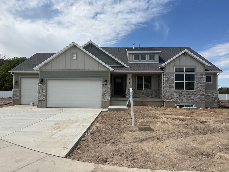 Step inside to an open-concept/vaulted ceiling layout filled with natural light, and enjoy a spacious gourmet kitchen, huge pantry, oversized mudroom and living area ideal for entertaining. With a 4-car garage, there's no shortage of space for vehicles, toys, or storage. Enjoy pickleball courts & park nearby or the nearby golf course just down the road. All of this is just minutes from US-89,I-84, I-15,Hill Air Force Base & Northrup Grumman. Don't miss your chance to call Riverwood home - where comfort meets convenience in one of South Weber's most desirable new communities.