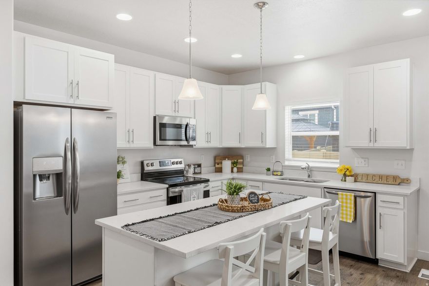 Welcome Home! This immaculate, end-unit townhome in Eagle Mountain is waiting for you!  The main level features a gorgeous living room with soaring ceilings and so much natural light, a spacious kitchen with abundant cabinet space, a large center island that's perfect for gathering, and a convenient half bath for guests.   UPSTAIRS, escape to your primary suite, complete with convenient dual closets, a large bathroom, and plenty of space to relax! Two additional bedrooms filled with natural light, and another bathroom complete the upstairs space.  BASEMENT: The fully finished basement adds incredible versatility, offering a generous living room, an oversized full bathroom, and an additional bedroom featuring stylish barn doors-perfect for guests, a home office, or multi-generational living.  OUTSIDE: Enjoy the fully fenced backyard with patio space ideal for relaxing or entertaining. Enjoy the many parks and the community pool just down the street, and schools, restaurants, and shopping close by!  Don't miss this opportunity to own a move-in ready home in a thriving Eagle Mountain neighborhood-schedule your showing TODAY!