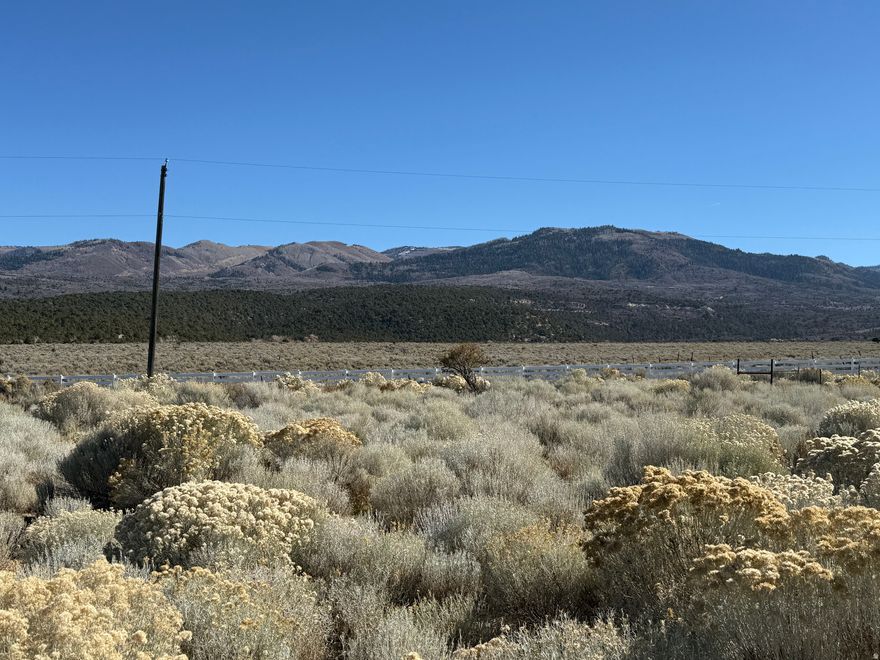 If you've been waiting for the perfect lot that's close to the city yet surrounded by stunning mountain scenery, look no further. This exceptional property offers the best of both worlds-easy access to urban convenience and the peace and beauty of nature. With breathtaking views, gently rolling terrain, and plenty of space to build your dream home or getaway, this lot is truly a rare find. The property includes access to a shared well, available for use by up to six neighboring owners. To utilize the well, a water right is required but not included. If you prefer full independence, there's also the option to drill your own private well. Seller Financing options are available. Lot # 4