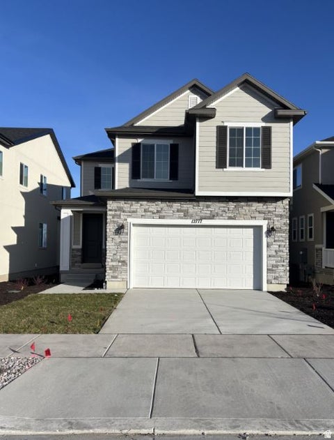 Photo of 12797 S GLACIER TRAIL LN W #175, Herriman, UT 84096 (MLS # 2177296)