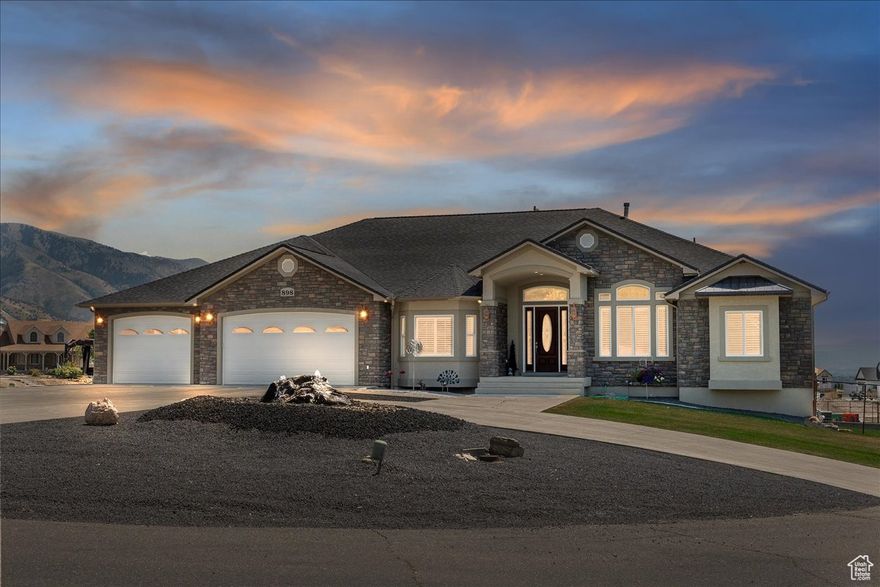 WOW **This home is in IMMACULATE condition and is meticulously maintained and move in ready!!** The beautiful East bench location is made even better because it is in a quiet cul-de-sac on 1.01 acres with gorgeous mountain and valley views and has animal rights! Convenient centralized location, just 10 minutes from downtown Logan and USU campus.  Large circular drive with water feature and plenty of parking all around the home, as well as upper and lower garages that can comfortably fit 9 cars or more! Both have hot & cold water, 220 power, drains, central vac, and heaters. Home has open concept living, great for entertaining with large granite island, double ovens, plenty of extra lighting, surround sound, and opens onto a nice covered deck with tiled floors. There is tons of storage throughout, two laundry rooms, two furnaces, water softener, mud room, and a great master suite.  The light and bright basement boasts 9' ceilings, full kitchen with island, large rooms and windows, walk-out onto covered patio and fenced grassy yard.  Lower property has 2 frost free water hydrants as well as power.  This home is well built with too many extras to list here, see attached special features page.  Agent is related to the seller.