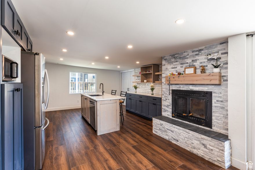 This recently remodeled home features a stunning solid walnut wood front door. Come in to see a new kitchen with quartz countertops and two-tone shaker cabinets. Explore the possibilities of rental income by utilizing the duplex option. Located down the street from Utah State University Eastern this home has a separate entrance and is zoned as a duplex. This creates a unique opportunity with this property, making it the best option for those wanting to start building wealth through real estate. Whether you're envisioning a modern residence for your family or an investment property in a prime location, this house offers endless possibilities. Seize the opportunity to make it your own! Don't miss out on this rare combination of style, versatility, and investment potential. Schedule a showing today and experience the charm of this remodeled home in the heart of Price.