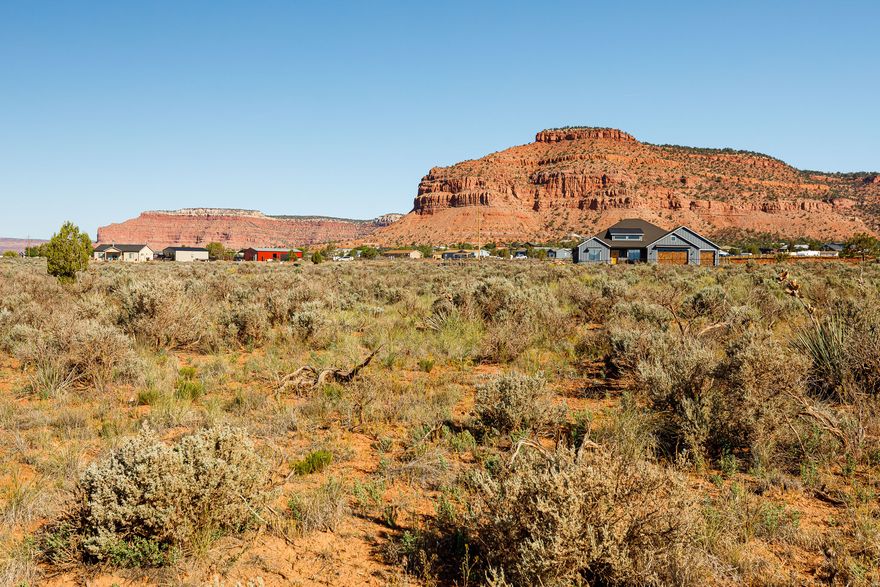 Discover your own piece of Southern Utah paradise with this incredible 2.39-acre parcel located just 4 miles east of Kanab in the highly desirable Sunflower Valley Estates. Surrounded by breathtaking panoramic views of Kanab's world-famous red cliffs, this property offers the perfect blend of privacy, scenery, and convenience. Priced aggressively compared to other lots currently on the market, this is an exceptional opportunity to secure acreage in one of the area's most scenic settings. Looking for investment or private home? This parcel checks the boxes. Even better, the property comes with professionally designed plans for a stunning 2-story, 2,680 square foot home. The thoughtfully designed layout features expansive living spaces and a large upper deck perfectly positioned for relaxing evenings, entertaining guests, and taking in Southern Utah's incredible star-filled night skies. Located near the many outdoor adventures of the Kanab area including hiking, ATV trails, Lake Powell, Zion National Park. Buyer to verify all details. Call for more information today.