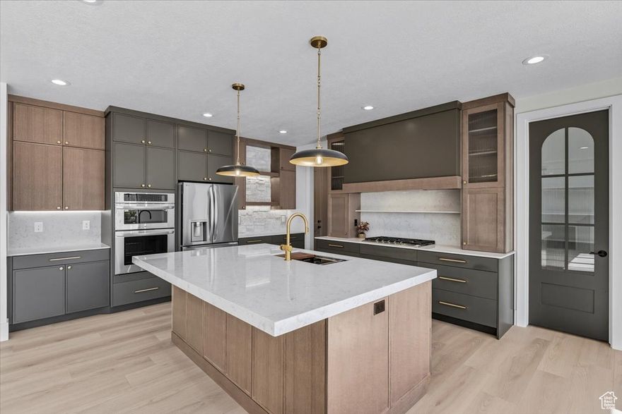 New...Move-in-Ready...And under $1M.  Make your move quick! This Lux Modern Cottage is full of the latest on-trend design and upgraded and better priced  more than any other builder spec listed nearby.  Includes an oversize 40ft x 16ft RV pad is perfect for all your toys with room to extend another 40 ft if desired! A simply gorgeous kitchen with moody walnut cabinets, a statement range hood, and a custom pantry door are all enhanced by the light-filled open floor plan. A custom built cast stone fireplace is perfectly accented by the built-in shelves with perfectly balanced stone accents. The primary suite bathroom vibes are both spa-like and luxurious with upgraded tile, lighting, and beautiful Moen fixtures. This home is both cozy and spacious, modern and timeless, detailed and cohesive. The professional landscaping is designed to fill in with beautiful flowers and color each spring and fall season. Welcome to the Colibri Homes experience where every detail of your DREAM HOME has been custom crafted.  Buyer to verify all info.