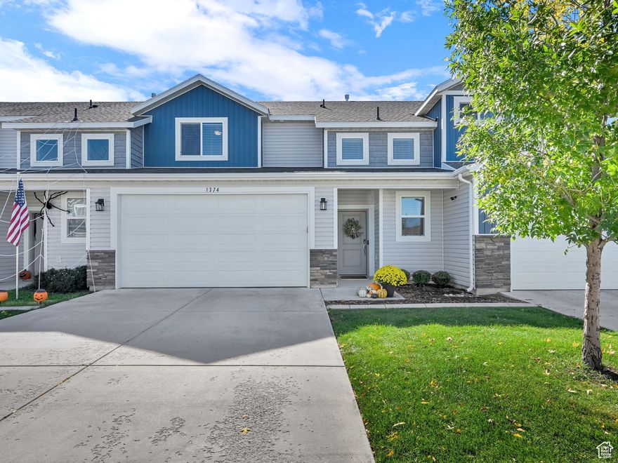Welcome Home to this amazing 3-Bed, 2.5-Bath Townhome in the desirable Elk Mountain Community! This spacious townhome features abundant natural light and highlights the bright, open floor plan. The large windows create an inviting atmosphere full of modern style and comfort. The kitchen boasts granite countertops, upgraded cabinetry, stainless steel appliances, and a large pantry. Upstairs features 3 large bedrooms, including a primary suite with a walk-in closet and private bath. The laundry room has cabinets and a drying rod. The attached garage offers ample built-in storage, perfect for tools, gear, and seasonal items. Step outside to your fenced private patio-ideal for relaxing, grilling, or entertaining. As part of Elk Mountain, enjoy superior HOA amenities including clubhouse, pool, spa, fitness center, park with pavilion, barbeque grills, and maintenance-free living. This townhome is a short walk to Blacksmith Fork Park, featuring a skate park, pickleball and basketball courts, splash pad, and more! Set against beautiful mountain views in a peaceful, wonderful neighborhood, this home offers easy access to schools, shopping, and recreation. It's the perfect blend of comfort, and convenience. Square footage figures are provided as a courtesy estimate only. Buyer is advised to obtain an independent measurement.