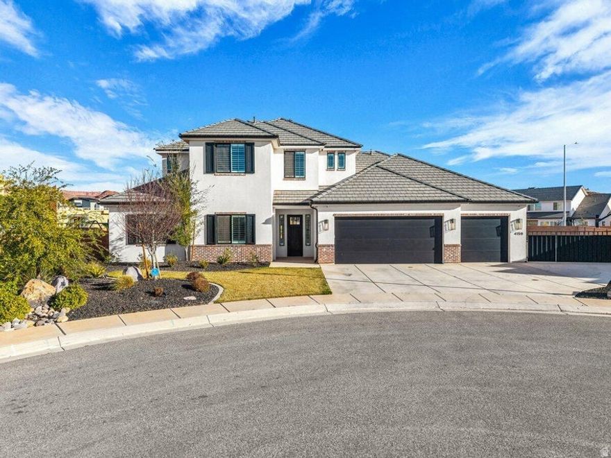 Located in the heart of Washington, this beautifully maintained home offers a bright, open feel with white finishes, tile flooring, custom windows, and high baseboards throughout. Automatic blinds on the main windows and plantation shutters in the remaining spaces provide both everyday convenience and timeless style. The stunning kitchen is equipped with GE Caf appliances, a Frigidaire Professional refrigerator, and a large butler's pantry offering abundant storage and functionality. The spacious primary suite is a true retreat, featuring a soaking tub, walk-in tile shower, double vanity, and a generous walk-in closet. Additional bathrooms are thoughtfully designed, and the oversized laundry room includes ample cabinetry and counter space for added organization. Upstairs, a large entertainment room provides the perfect space for movie nights, games, or gatherings, while the main living area is anchored by a cozy gas fireplace with beautiful built-in shelving. Step outside to enjoy a covered patio, lush grass backyard, private basketball/pickleball court, RV parking, and a three-car garage, plus added perks like Everlights and a security system with cameras for extra peace of mind. Buyer to verify all information, deemed reliable, however buyer to verify all info including utilities, rental restrictions, and HOA information if applicable.