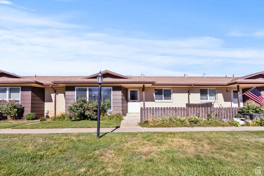 FHA approved! The HOA covers the majority of utilities. MOTIVATED SELLERS are ready to work with a reasonable offer.This clean and very well-kept home provides main-floor living at its finest. The floor plan features an open feel with large rooms ideal for relaxing and entertaining. The kitchen is between the formal living room and a great room area, making it convenient for either setting. The primary bedroom suite features a full bathroom and walk-in closet. There is a small garden area for those who love to plant flowers or grow a few vegetables. The carport is oversized and is attached to the home through a back patio. Home sold AS-IS. Vacant easy to show.