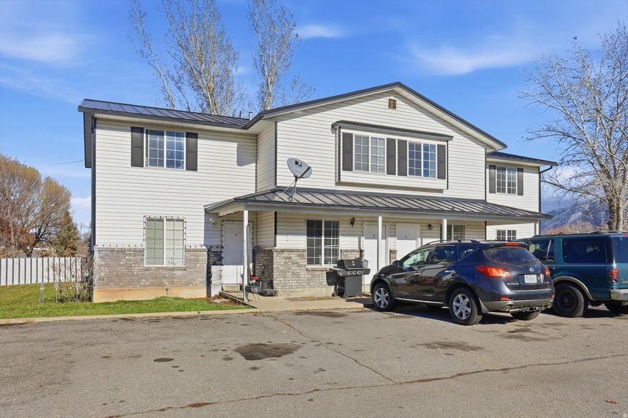 Fantastic investment opportunity in Hyrum! This well-kept 4-Plex sits on 1.13 acres. Each unit offers 2 beds, 1.5 bathrooms, and in-unit laundry hook-ups. Two units were just finished updating with new flooring, paint and all new appliances, providing great appeal for both owners and renters. The property includes a spacious Quonset Hut - perfect for storage, workshop, extra income or additional uses. Property also has a variety of fruit trees and plenty of space to grow a garden or pasture an animal.  Conveniently located just down the street from Hyrum Dam, tenants will love the access to recreation, views and all that Cache Valley has to offer.  Whether you are expanding your portfolio or looking for a solid income-producing property, this 4-plex checks all the boxes. Even perfect for a House Hack - Unit 4 will be left vacant in case buyer would like to occupy it.  Square footage figures are provided as a courtesy estimate only and were obtained from _Appraisal_ .  Buyer is advised to obtain an independent measurement.