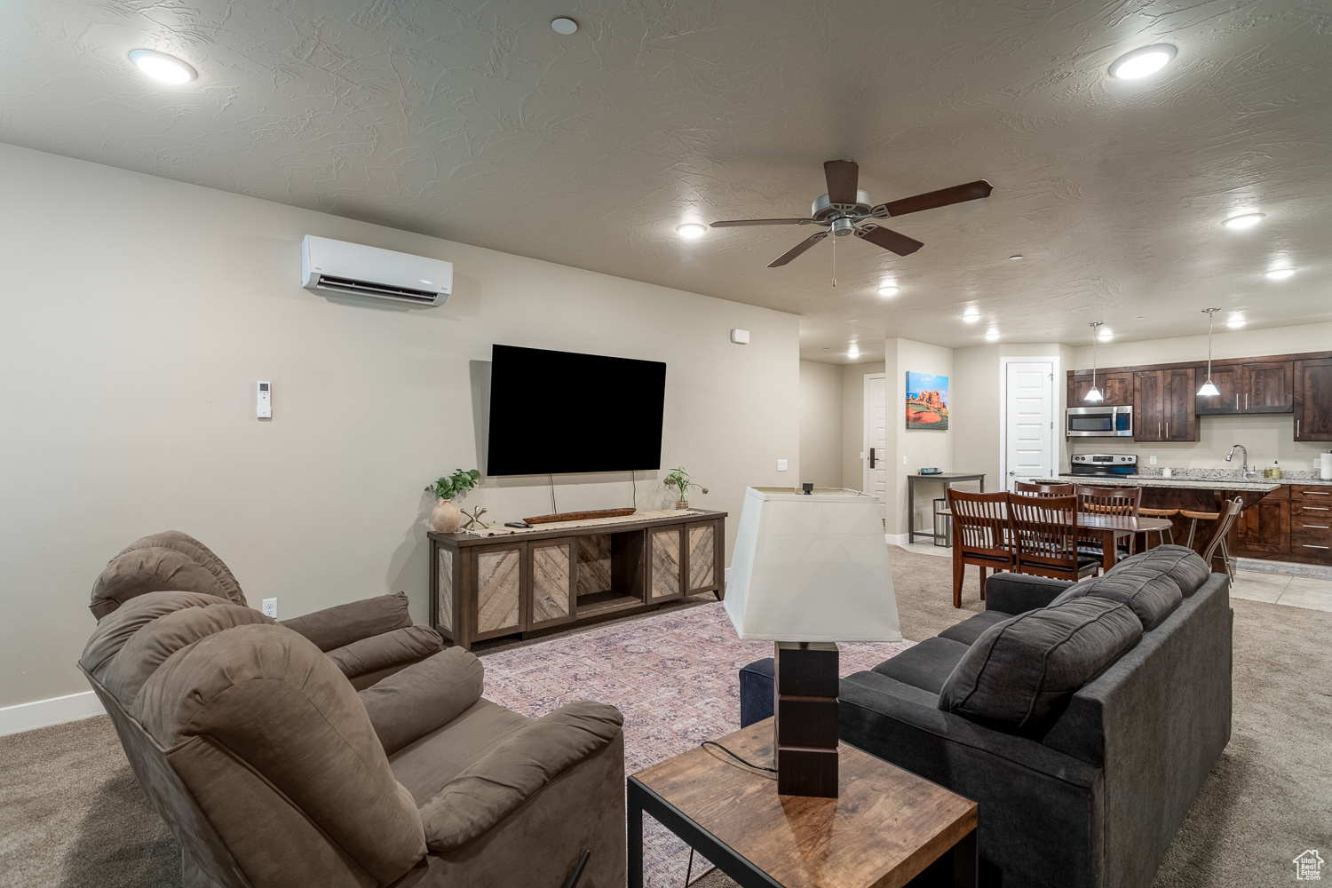 Nestled within the exquisite Sand Hollow Resort community, this fully furnished luxurious condo in Hurricane, UT offers an unparalleled living experience for golf enthusiasts, vacation renters, and nature lovers alike. Imagine waking up to breathtaking views of a pristine golf course set against the dramatic backdrop of red rock formations, or sipping your morning coffee while basking in the abundant natural light that floods this spacious two-bedroom main-level unit. The condo boasts a beautifully designed layout featuring granite countertops and a large great room, ideal for entertaining friends after a day on the greens or exploring nearby attractions. Sand Hollow Resort is Southern Utah's premier master-planned golf community, offering residents a taste of resort-style living with its picturesque vistas and abundance of natural attractions. Escape the hustle and bustle of city life and immerse yourself in the tranquility of resort living, complete with access to three sparkling pools and an 18-hole championship golf course. For those seeking adventure, the nearby Sand Dunes offer adrenaline-pumping fun, while the serene Sand Hollow Reservoir invites you to unwind under the expansive, star-filled night sky. Whether you're looking for a peaceful retreat or an exciting vacation rental opportunity, this condo offers the perfect blend of relaxation and excitement.