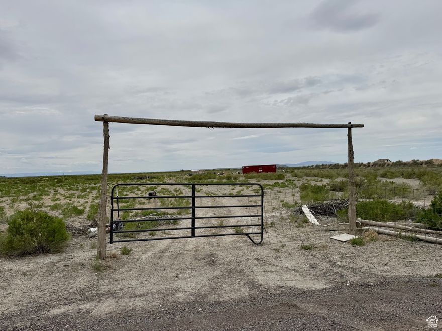 Approx 38.5 acres west of Hinckley on a county maintained gravel road. This property falls in an area you can obtain an underground water right so you can drill a private well.  You need 1 acre foot of water to qualify for a building permit, so this one can be used for residential use. Large cargo container is included. To access: from Hinckley City Main Street, turn west on Center Street and go west 1.5 miles, this is NE corner of the 38.5 acres. From there, property goes another 1/4 mile to the west. Property is approx 1/4 mile x 1/4 mile. Subject property is on the south side of the road. Hinckley City owns property to the east. Address is approximate and based out of Delta City address grid. Application fee of $150 with Division of Water Rights for New Water Appropriation.