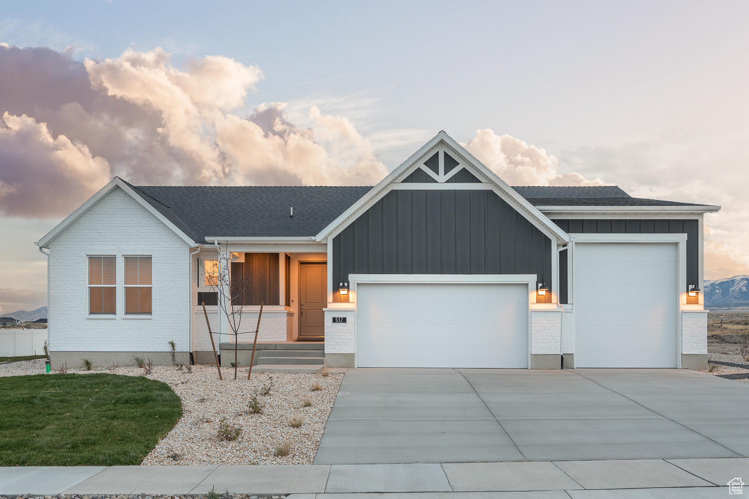 Beautiful brand new 1700 Farmhouse model home, where charm meets modern convenience! This stunning home offers elevated style and practicality throughout with a modern kitchen that features white laminate cabinets, sleek quartz countertops, and stainless steel gas appliances. Laminate hardwood, vinyl tile, and carpet flooring are highlighted providing a perfect balance of comfort and durability. The expanded 3-car garage with keypad access offers ample space and convenience, while the box windows in the kitchen nook and owner's bedroom bring in natural light and architectural charm. Designed with thoughtful details like Christmas light outlets, 2 tone paint, a grand bathroom Welcome to the 1700 Farmhouse, where charm meets modern convenience. This stunning home, upgraded with the exclusive Gold Package, offers elevated style and practicality throughout. The kitchen features white laminate cabinets, sleek quartz countertops, and stainless steel gas appliances, combining elegance with functionality.  With laminate hardwood, vinyl tile, and carpet flooring, the home provides a perfect balance of comfort and durability. The expanded 3-car garage with keypad access offers ample space and convenience, while the box windows in the kitchen nook and owner's bedroom bring in natural light and architectural charm. Designed with thoughtful details like Christmas light outlets, 2 tone paint, energy-efficient options and a 40-gallon water heater ensure sustainable living without compromising comfort. The grand bathroom, featuring cultured marble surrounds and and chrome and satin nickel hardware, exudes a polished and timeless appeal and creates a spa-like retreat.  The 1700 Farmhouse is a stylish, functional, and inviting space for you to call home. Come check it out today!