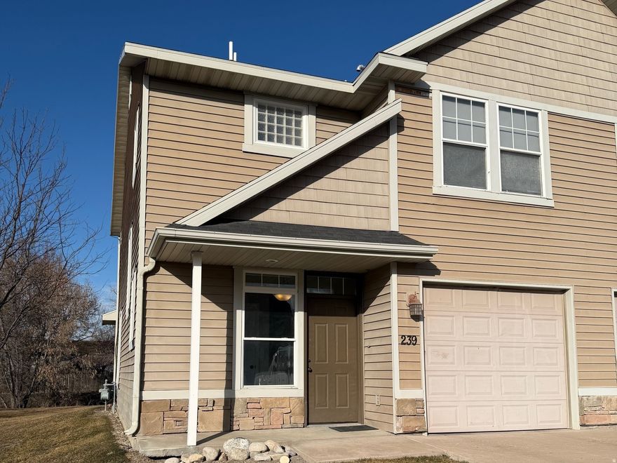 Presenting  a unique opportunity to buy in the Hidden Creek development located near all the amenities of Providence and Cache Valley! Hidden Creek is a charming townhome development off of Bluff Street and is centrally located to shopping, schools, and parks!  This end unit has 3 bedrooms, 2.5 baths and boasts updated amenities such as a new (last 2 years) fridge!  This offer also includes the washer and dryer!  HOA dues cover water, trash, snow removal and lawn care!