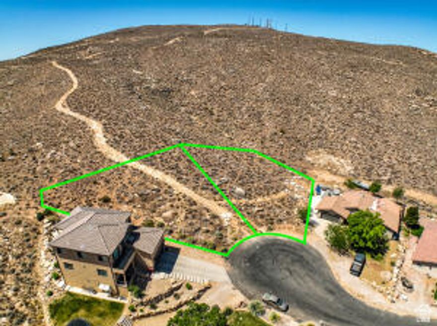 Both 2379 and 2364, lots 59 & 60 are backed up to the hill, this large double lot in Bloomington Hills is at the end of the Cul-De-Sac. Unbelievable 180 degree views of the city and Pine Valley Mountain.