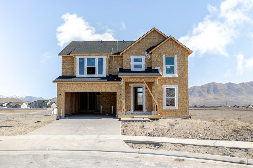 Welcome to Rose Ranch-an exciting new community in the heart of Eagle Mountain! These thoughtfully designed single-family homes shine with larger lots, giving you space for a three-car garage and plenty of outdoor living. Rose Ranch offers a vibrant, community-focused lifestyle with pickleball courts, the Eagle Mountain Ranch Bike Park, nearby schools, and easy access to local favorites like The Ranches Golf Club, Utah Lake, scenic parks, and trails. Surrounded by stunning mountain views, it's the perfect place to call home. Contact us today to start planning your future in Rose Ranch! (NATALIE LOT 114)