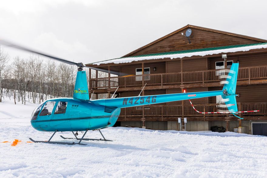 This 20 bedroom Lodge, perched atop the Eden and Cache Valleys, Pineview and Causey Reservoirs, and Powder Mountain and Snowbasin Ski Resorts, sleeps over 60 people comfortably. Find plenty to do on your own 74 acres with a shooting range, trails, ponds, Utah's largest residential zipline course, horse corrals, fire pits and much more. The property also gives you direct access to Cache Valley National Forest and School Board Trust Land where you can enjoy hunting, hiking, camping, Heli Skiing, and riding both summer and winter all terrain vehicles for miles and miles. Each and every guest will be able to relax in style in one of the 16 private guest suites that feature their own fireplaces, new flooring, remodeled bathrooms, new ceiling fans and new mattresses. You will find plenty of room for gathering and entertaining in the large, open main lodge, which boasts an enormous fireplace, plenty of seating, and a dining area for the whole group. Prepare meals in the commercial grade chef's kitchen with new fridge and freezer, wolf range, ice maker and even a commercial dishwasher. With the perfect balance of indoor and outdoor living, the large, recently renovated deck is perfect for outdoor entertaining, wedding, or a morning yoga session with your guests. Downstairs you will find an additional 4 guest suites, a theater room and two large gaming areas along with a workshop for crafts and projects. The lodge is completely off grid, and features a private well with back-up storage tank, power from your 50 panel solar system with a Humless brand back-up battery stem and two large Cummins brand generators. A full security system features ViaStat high-speed internet, digital door locks on all doors, water sensors, smoke alarms and a full security system powered by Vivint, including exterior cameras. This property is perfect for groups of all sizes, and has previously been used as a motel. Both summer and winter vehicles can be rented 2 miles down the road at Club Rec.