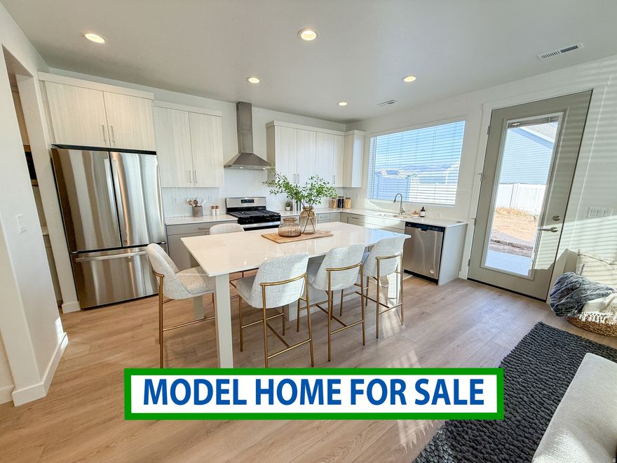 GORGEOUS MODEL HOME FOR SALE and LAST END UNIT, DON'T wait on this one!!! The pictures tell it all! This fantastic, end-unit townhome is loaded with upgrades! The kitchen is roomy with great storage, butler's pantry, stainless steel hood and upstairs you'll find three comfortable bedrooms, 2 baths, and a primary suite with large closet. The oversized concrete patio is perfect for private outdoor dining or just relaxing. Smart-home perks are already in place, including a Ring doorbell, keyless entry & Nest thermostat. The community is unmatched... 7 miles of walking trails, multiple parks, generous open space, picnic areas, pickleball courts, a dog park, and even a stocked fishing pond. Lawn care and snow removal are taken care of, so you can simply enjoy where you live.  Offering $10,500+ incentive with our preferred lenders!! If you've been searching for a townhome that truly checks every box, this one is a must-see!