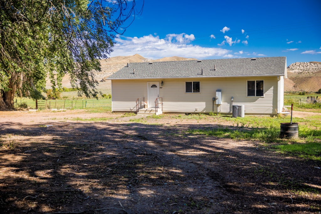 Photo of 7465 E BRUSH CREEK RD, Jensen, UT 84035 (MLS # 2186771)