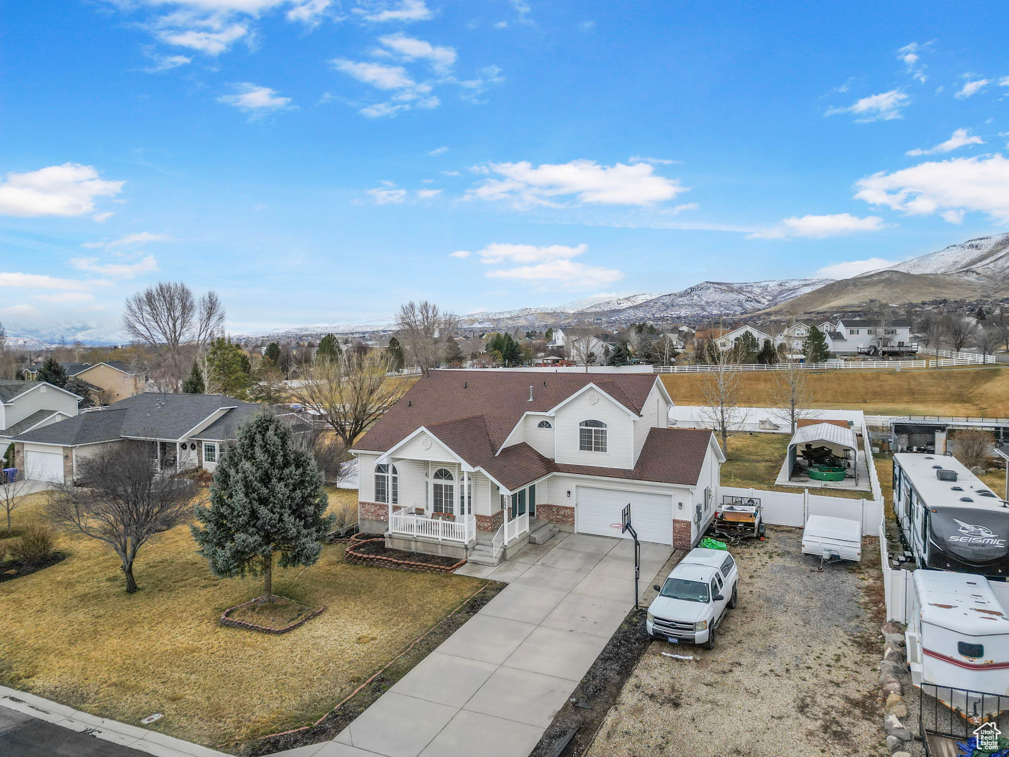 RARELY AVAILABLE HORSE PROPERTY AND OVER .5 ACRES! Over 200' of RV/boat parking. Solar is paid off also. No backyard neighbors. Beautifully updated 5 bed 3.5 bath property on a .57 acre lot on a quiet cul-de-sac with 360-degree views. Green Belt behind lot, public horse arena just three blocks south, multiple trailheads, and beautiful parks, all within walking distance. You'll fall in love with the large updated primary suite with 3 shower heads, reclaimed barn wood vanity, and linen closet. Vaulted ceilings, 2 living rooms, 1 family room, and a great primary suite with a huge cedar-lined walk-in closet. Home office and a craft/hobby room. Carport 14x30, Backyard slab 18x110, Pergola 14x12.  The basement room is already plumbed for a future wet bar. Tons of storage in the garage with a workbench. Large storage shed included. Plenty of room in the back for a future shop/garage. Buyer to verify all info. OWNER/AGENT. Square footage figures are provided as a courtesy estimate only. The buyer is advised to obtain an independent measurement. The seller is offering a $1500 paint allowance