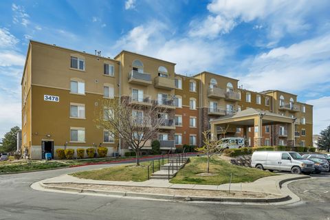 Photo of 3478 S COZY RIVER PL W #407, West Valley City, UT 84119 (MLS # 2147707)