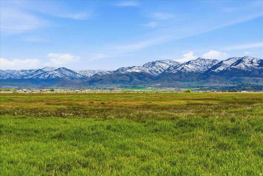Excellent pasture ground featuring approximately 28.6 acres. Or potential Residential building Lot with Zoning approval from Cache County. Located along an approved graveled county road with convenient access. Includes an artesian well on the property. Ideal location for those looking for space for animals or agricultural use or a future home. Includes parcel numbers: 04-022-0018 and 04-022-0019. Buyer to verify all information.