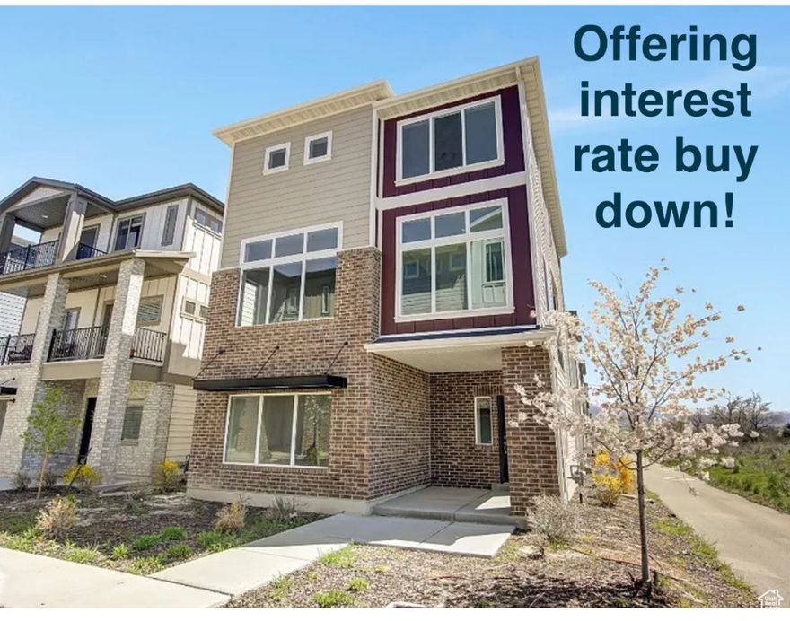 OFFERING INTEREST RATE BUY DOWN!!!! Experience a beautiful, single family (non-attached), end unit home in a beautiful and convenient location. The gorgeous kitchen boasts a spacious island and granite countertops, perfect for culinary enthusiasts. Enjoy stunning views from the deck and main rooms, and take advantage of the location within walking distance to Station Park. Experience fine dining, shopping, and easy access to trails. Commuting to Ogden and Salt Lake City is a breeze.