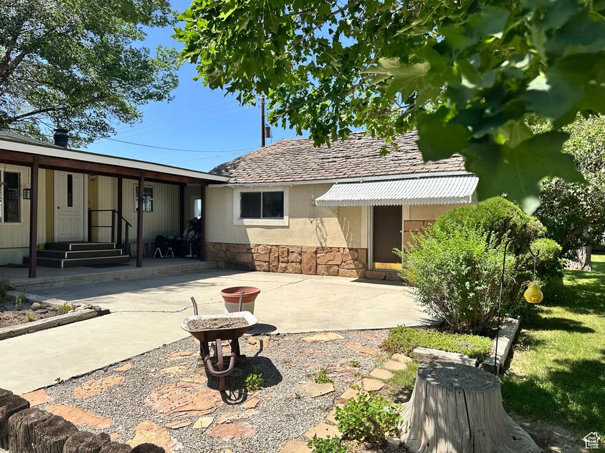 Not only does this mobile home offer 2 bedrooms and 2 baths but an ADU with a large bedroom adjacent. This lot is fully fenced and also has a metal 3 car garage/workshop space that is heated, chicken coop, and corals. This listing also includes 2 agricultural land parcels (02-1934-0000 & 02-1934-0001) with over 6 acres to grow alfalfa, etc. Water Wheel line and secondary water shares are included in the purchase. Square footage figures are provided as a courtesy estimate only and were obtained from County Records.  Seller will consider Seller-Finance offers with 20% down. Buyer is advised to obtain an independent measurement.