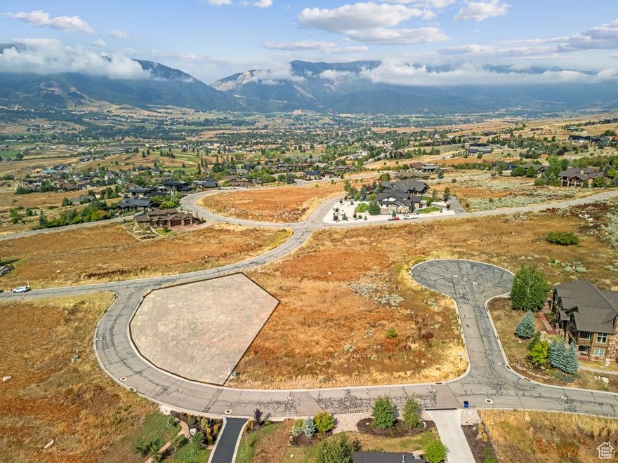Located in Eden's beautiful Highland subdivision, this level southern exposure corner lot offers an unparalleled opportunity to build a custom home in this quiet neighborhood. Surrounded by magical mountains, views of the lake and serenity that brings peace of mind. Highland subdivision offers the perfect blend of privacy and convenience, with quick access to Ogden valley, minutes from world class skiing at Snow Basin, newly owned Powder Mountain & Nordic Valley, golfing the gorgeous greens of Wolf Creek Golf Course, basking in the sun at Pineview Reservoir, hiking trails galore, and walking/biking trails to take in the clean crisp mountain air.